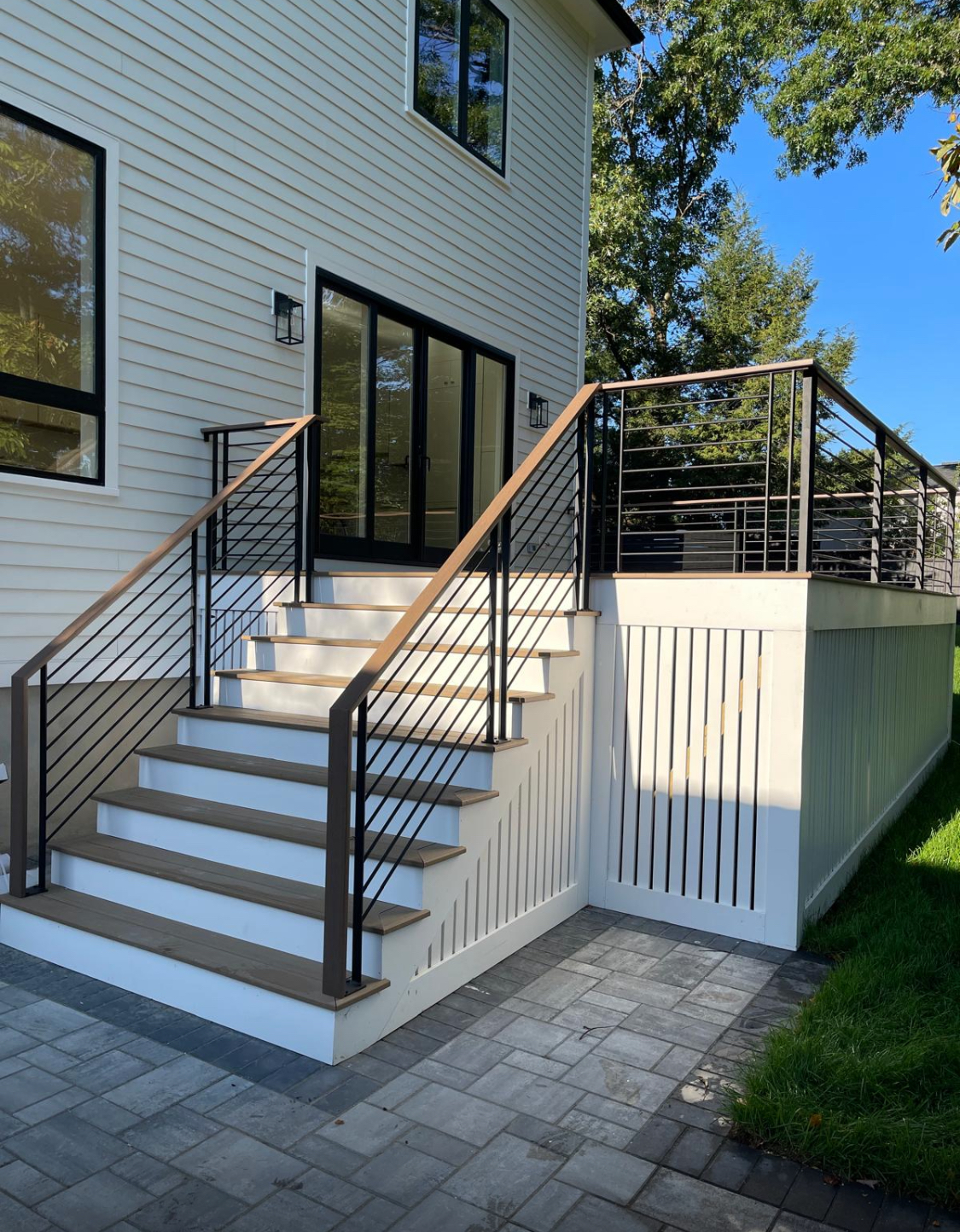 Custom deck railing — iron and wood combination