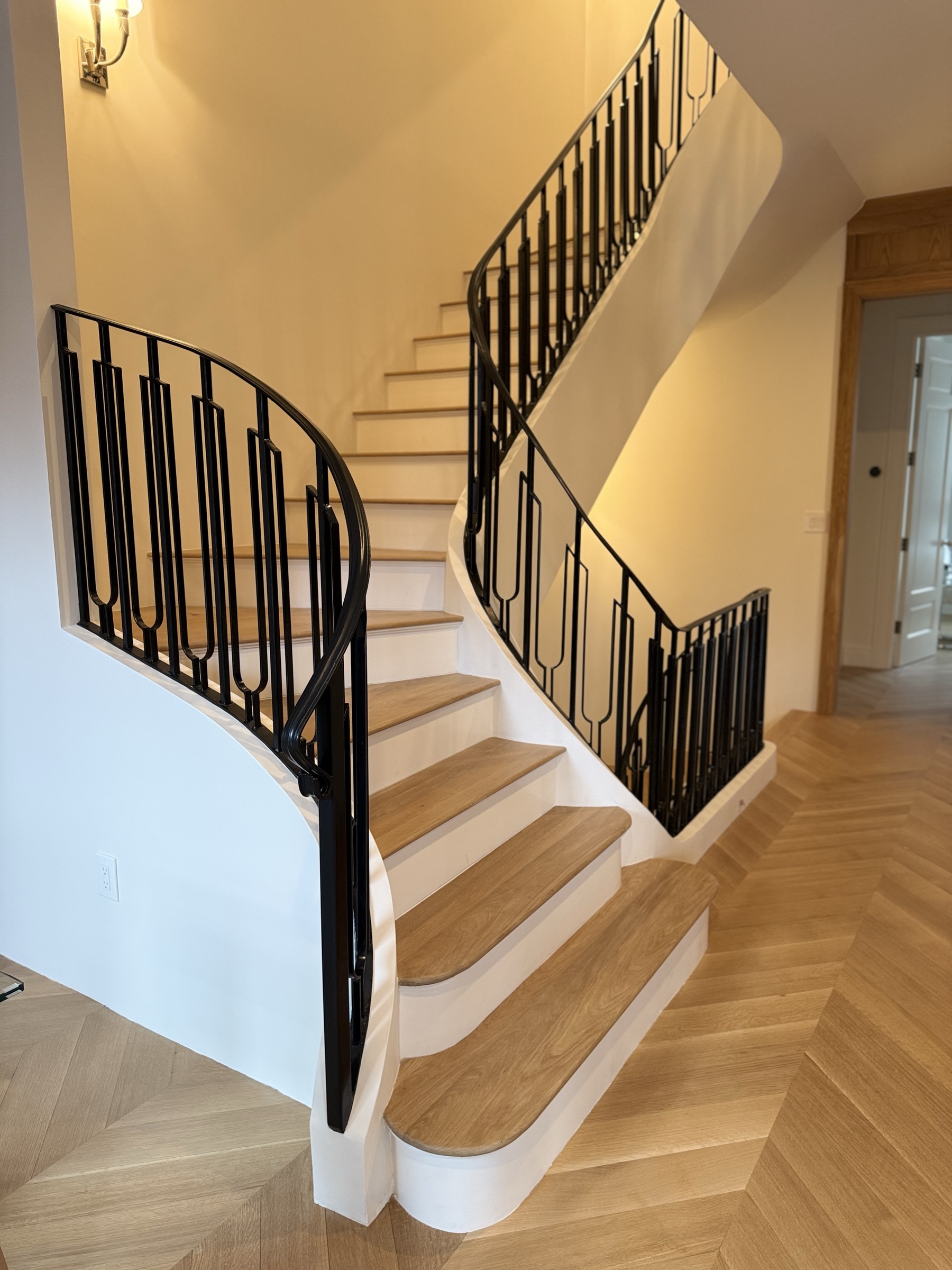 Luxury interior iron railing — the detail guests notice first