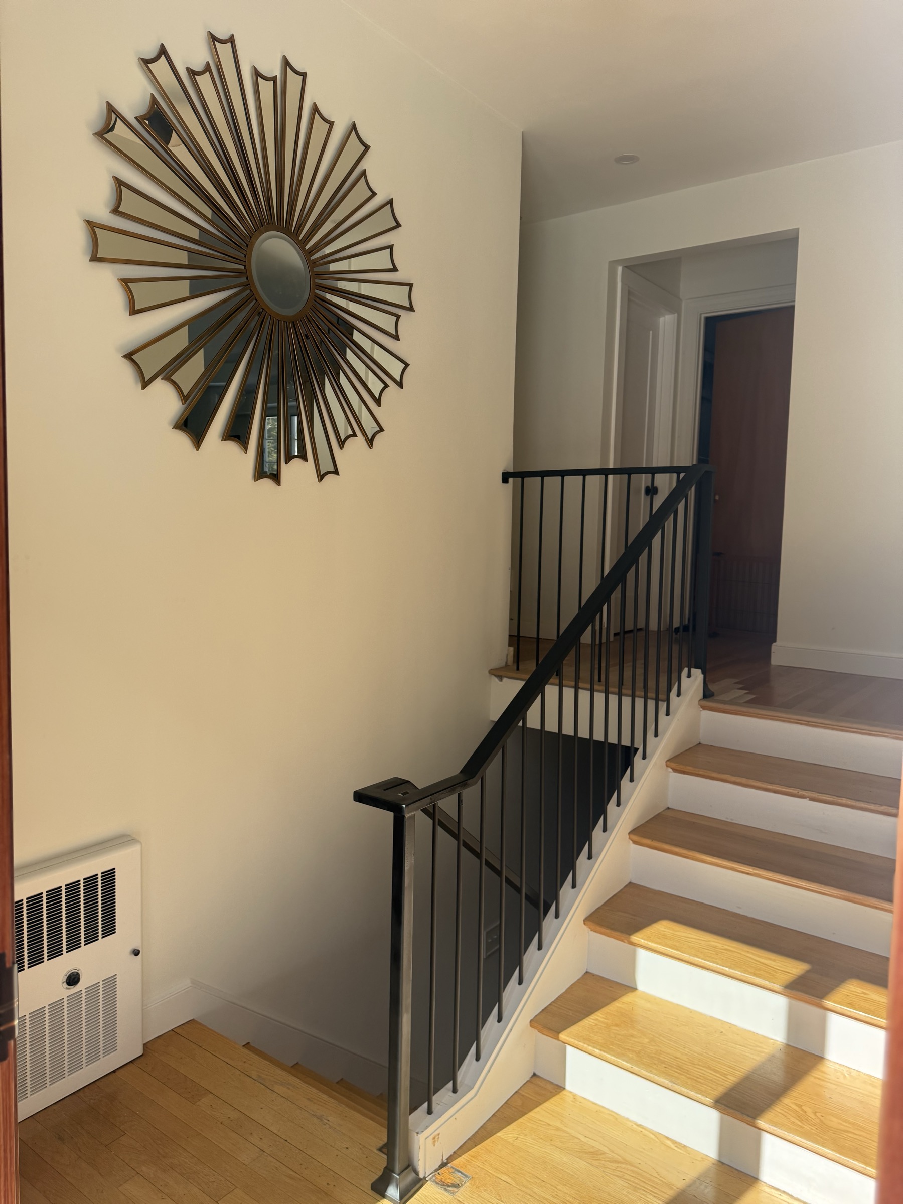 Custom interior railing with ornamental scrollwork